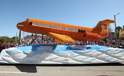 The Orlando Convention and Visitors' Bureau created a float of oranges, tangerines, and grapefruits—in recognition of the citrus float tradition—integrating its 'Orlando Makes Me Smile' campaign and partnership with AirTran.