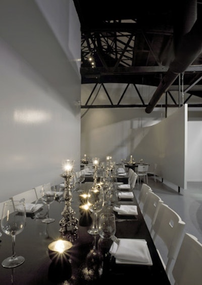 A back room with lofted ceilings and communal tables acts as the venue's primary function space.