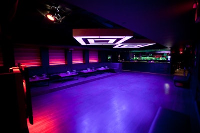 Flexible seating options include leather banquettes, love seats, and contemporary cocktail tables.
