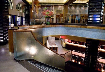 A staircase just inside the front entrance leads guests to the lower level, designed to feel like a grotto.