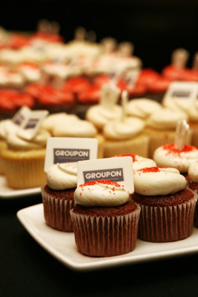 Topped with candies that bore the Groupon logo, the cupcakes came in flavors such as red velvet and chocolate.