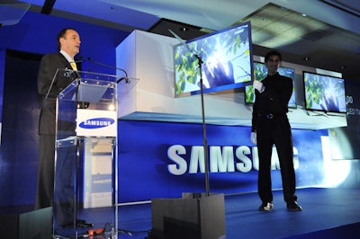 Tim Baxter, president of Samsung Electronics America's consumer electronics division, showed off the brand's new pencil-thin TV.