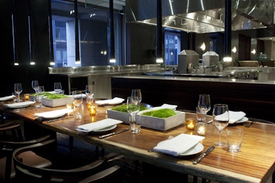 Behind the open kitchen is a 12-seat chef's table.