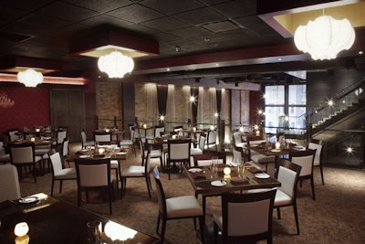 Overlooking the main dining area on the second floor, a mezzanine can host semiprivate dinners for 60.