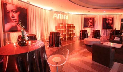 Sponsor Ambi created a lounge area at the after-party with amber lighting, a champagne bar, a display of Ambi skincare products and large, artistic portraits of Ambi models.