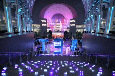 Giant teal BET letters fashioned from sequined velvet fabric served as the focal point of the after-party in the Reagan Building atrium, where hundreds of blue and white votives covered the main staircase.