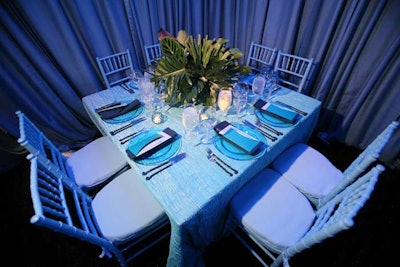 The 19 tables at the honoree dinner were topped with varying shades of blue tablecloths, some in sequined fabric, and low floral arrangements by Volanni.