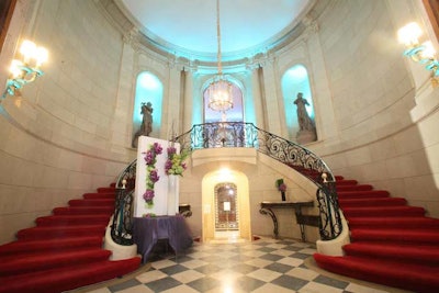 On Friday, guests entered Meridian House's sweeping vestibule, which was accented with teal lighting.