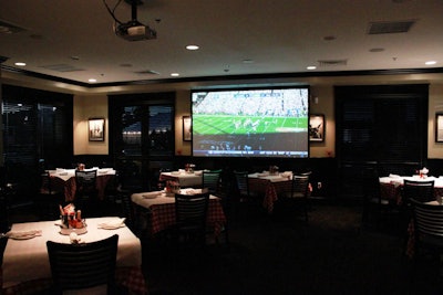 The private Atlantic dining room is equipped with a 10-foot projection screen for presentations or entertainment.