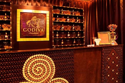 A mosaic of chocolates decorated a bar that served chocolate cocktails.