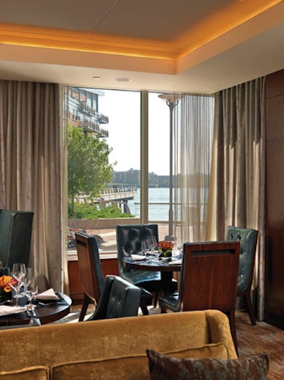 Small tables in the lounge provide space for casual get-togethers or breakfast meetings.
