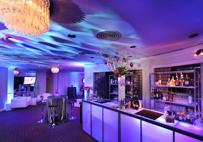 Chad Hudson Events produced Summit Entertainment's party in the Stardust Room on the Beverly Hilton's eighth floor, where a blue and purple scheme with uplighting and a mosaic-style gobo on the ceiling was created by by Visions Lighting. DJ Lee Dyson spun at one end of the room, and La Premier supplied the flowers.
