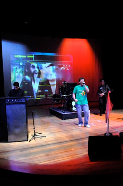 Organizers implanted the wires from the Rock Band drumsticks into a real drum set for a lifelike rocker experience in the center's Darden Theater.