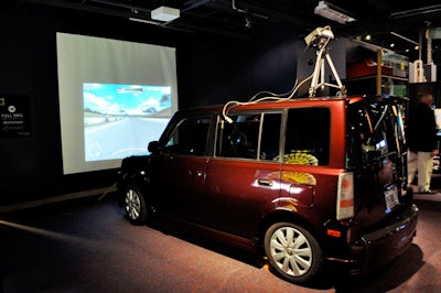 Scion created a racing simulator by outfitting one of its cars with motion seats and driver controls connected to the racing video game.