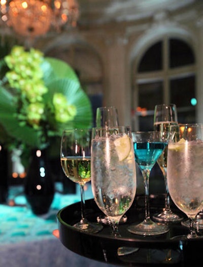 Guests at the honoree dinner found their seating cards on a table of towering arrangements by Volanni that included orchids and Chinese palms.