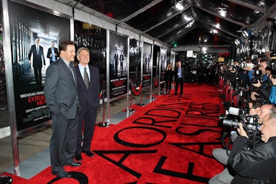 The movie's title emblazoned the custom carpet in front of Grauman's Chinese Theatre, where the threat of rain necessitated an arrivals tent.