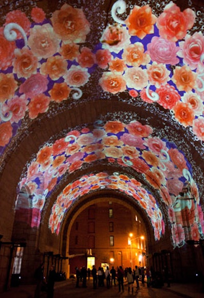 For the Dumbo Art Under the Bridge Festival in September, designer Sean Capone created 'Camera Rosetum,' a series of video projections in a tunnel beneath the Manhattan Bridge in Brooklyn. Capone worked with Dale Cihi of VideoFilm Systems to illuminate the ceiling of the tunnel with a rotating constellation of patterns, arabesques, and floral motifs.