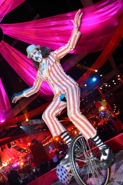 A clown on a unicycle from Lucent Dossier Experience was among the performers.