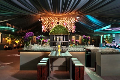 More than 5,000 yards of blue-green mirror organdy draping covered the ceiling at the party.