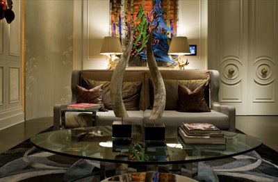 An Art Deco-inspired rug and custom furnishings filled the room.