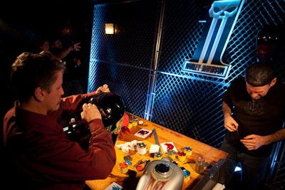 One of the night's biggest attractions was the team of house stylists—including Harley Davidson's senior director of styling, Ray Drea—who customized tanks with painted embellishments.