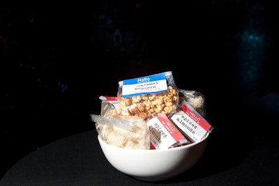 Instead of canapés, Harley supplied packets of snacks, including pork scratchings, spiced almonds, and chips.
