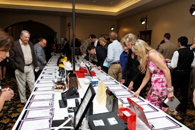 The more than 100 silent auction items on display outside the ballroom's main doors brought a 25 percent increase in auction revenue over previous years.