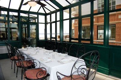 Three private glass conservatories can accommodate as many as 28 diners each.