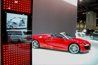 Audi used kiosks of red LED lights at the entrance to its new models exhibit.