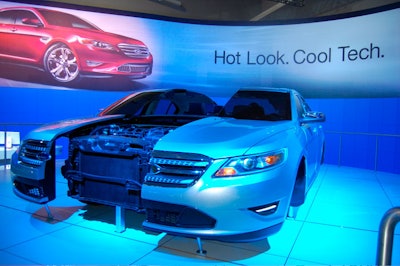 Ford's interactive 'Taurus Theater' display invited consumers inside a car cut-away for a two-minute video of the model's features.