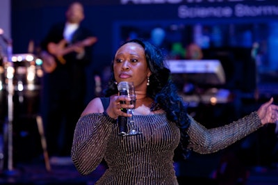 Local singer Terisa Griffin, known for her take on Prince's 'Purple Rain,' performed at 10 p.m. in the rotunda.