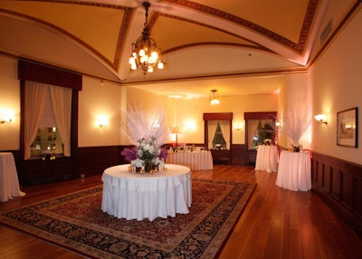 Adjacent to the lounge is the card room, a small space suitable for receptions.