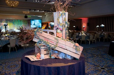 Reclaimed shipping crates, chains, moss, and twisted branches also appeared in the decor.