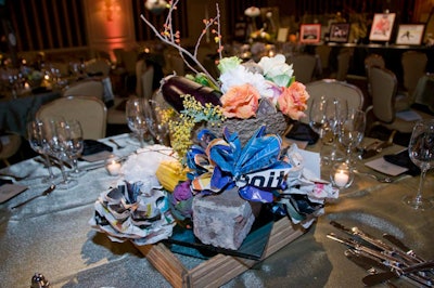 The centerpieces also incorporated berries, vegetables, stones, and wood.