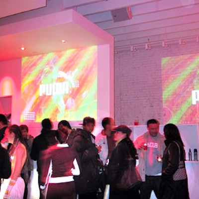 Visual entertainment company MX Works projected Puma-branded videos, logos and other images against the store's white brick walls.