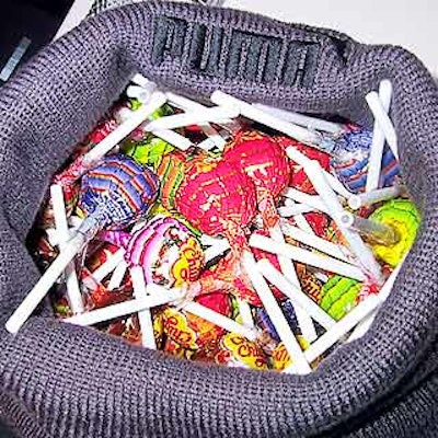 Knit Puma caps held lollipops at the party.