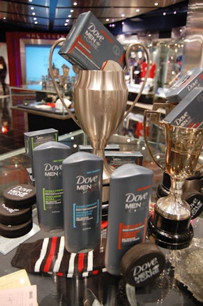 Stylist Janette Ewen created displays with trophies, hockey pucks, and samples of the new Dove products.