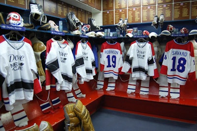 Hockey jerseys bearing the Dove Men+Care logo hung in the locker room area at the Hockey Hall of Fame, the site of the company's product launch.