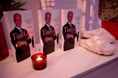 Gunn's book, Tim Gunn: A Guide to Quality, Taste & Style, was displayed and given to guests as a parting gift.