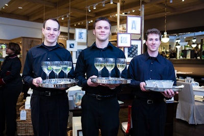 Servers from Finesse Cuisine circulated with trays of drinks, which were colorless to protect the merchandise from stains.