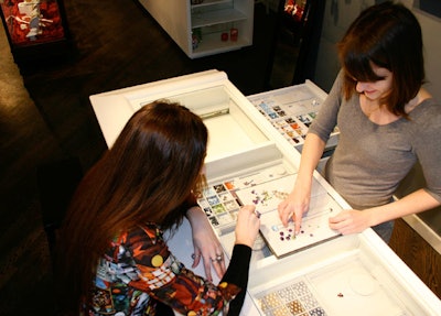 In Erin Gallagher's Lincoln Park studio, guests design custom jewelry by selecting metals and stones from a gem bar.