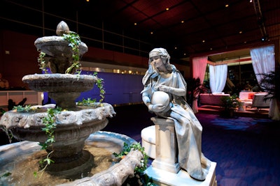 A model posing as a statue winked at guests throughout the night.