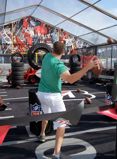 Bridgestone, the official tire of the N.F.L., sponsored a football throw tent at the Super Bowl Fan Zone at 8th Street and Ocean Drive in South Beach. Coors Light and McDonald's are among the other brands with activations at the Fan Zone, which opened to the public Wednesday and will remain on the sand through Saturday.