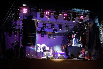 T-Pain was the headlining DJ atop a stage constructed over the Bud Light Hotel's courtyard entrance for GQ's party Thursday night for nearly 1,400 people.