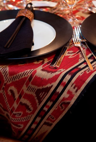 Sara Story Design draped a deep red printed fabric across her table.