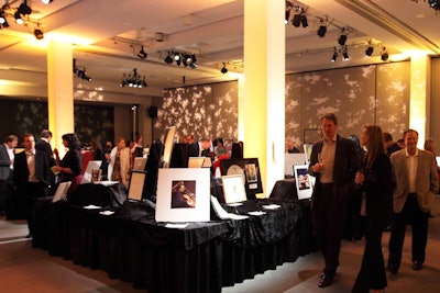 Lighting patterns dressed the walls of the silent auction area.