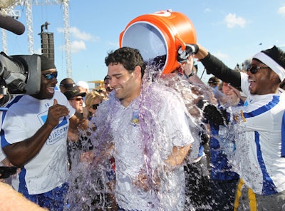 Spike HD players poured Gatorade over coach Mark Sanchez, quarterback for the New York Jets, after the team won.