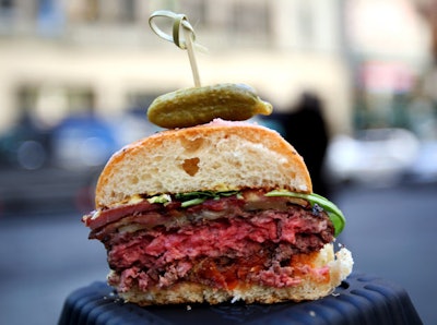 Boulud's spread included DBGB's Frenchie burger (pictured) as well as his Tunisienne sausage and croque monsieur.