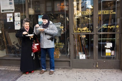 Consumers, like those in SoHo for Marea chef Michael White's porcetta sandwich on focaccia, ate their meals on the street.