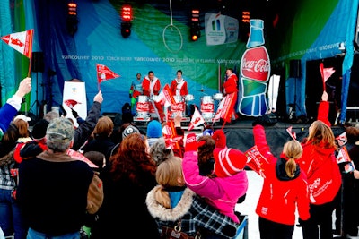 Residents in Burns Lake, British Columbia, watched Zero Gravity's Coca Cola-sponsored show prior to the arrival of the torch on stage.